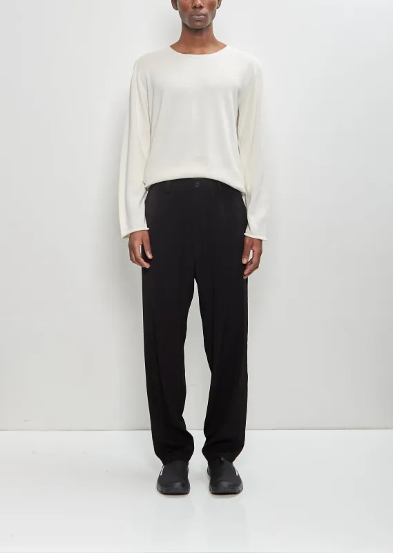 Slim Pants B sold by La Garconne