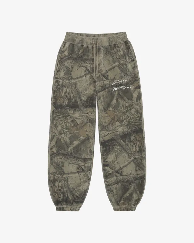 AKIMBO X CB REALTREE SWEATPANTS sold by Cole Buxton