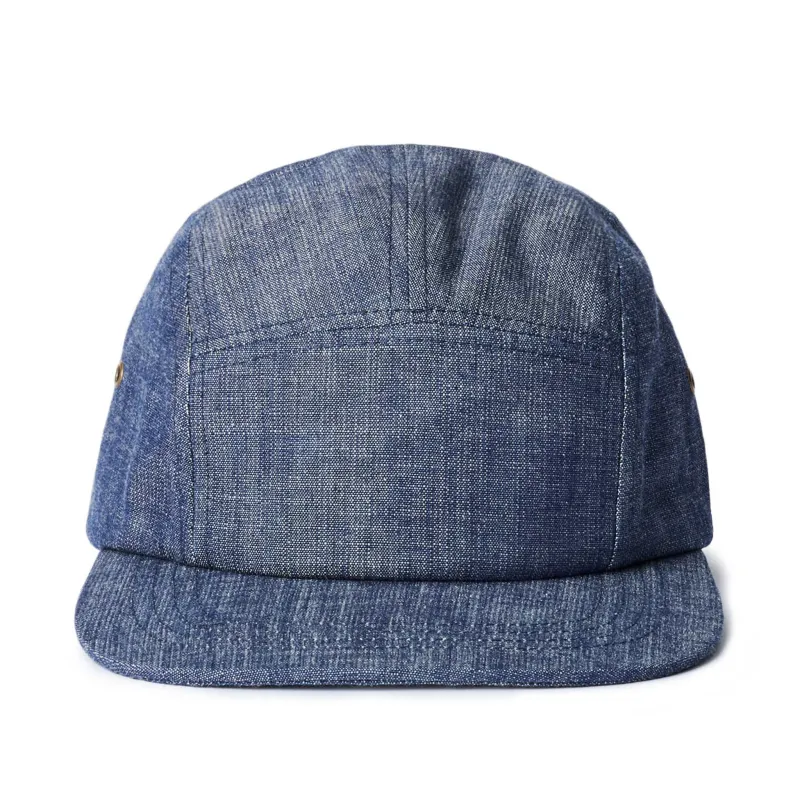The 5-Panel Cap in Washed Indigo sold by Taylor Stitch