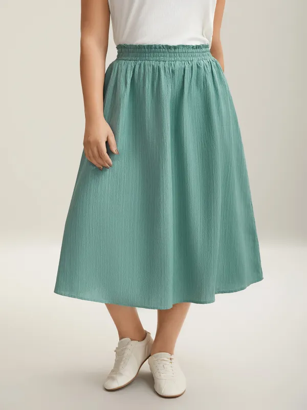 Smocked Waist Textured Pleated Midi Skirt sold by Bloomchic
