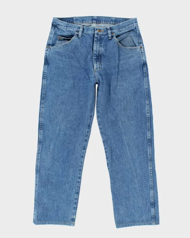 Vintage 90's Wrangler Faded Medium Wash Straight Leg Jeans - W30 L27 sold by Rokit