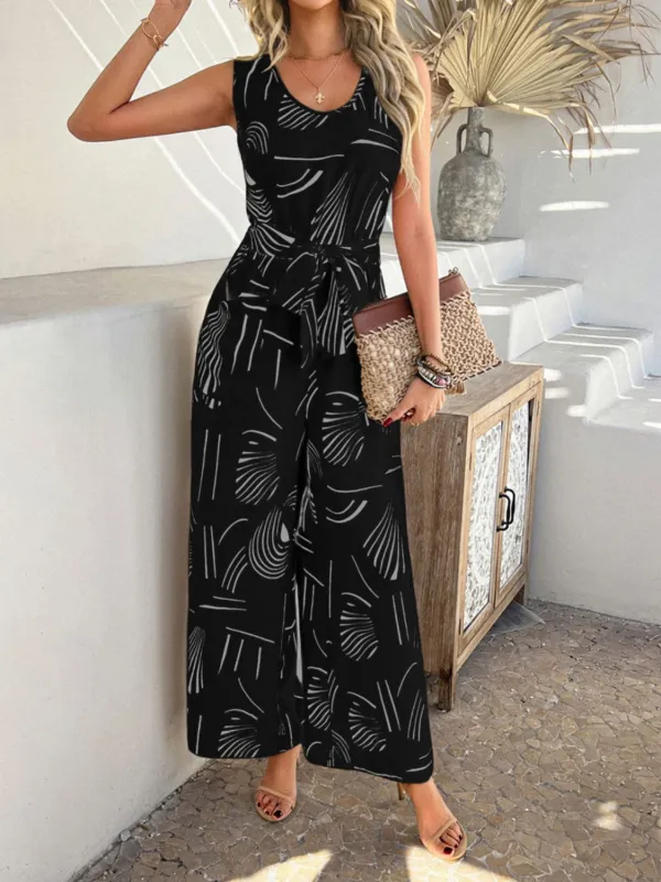 Devine Printed Round Neck Sleeveless Tie Waist Jumpsuit sold by Charming Charlie