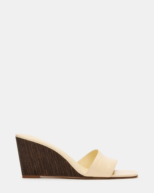 CURCIO BEIGE CROCODILE sold by Steve Madden