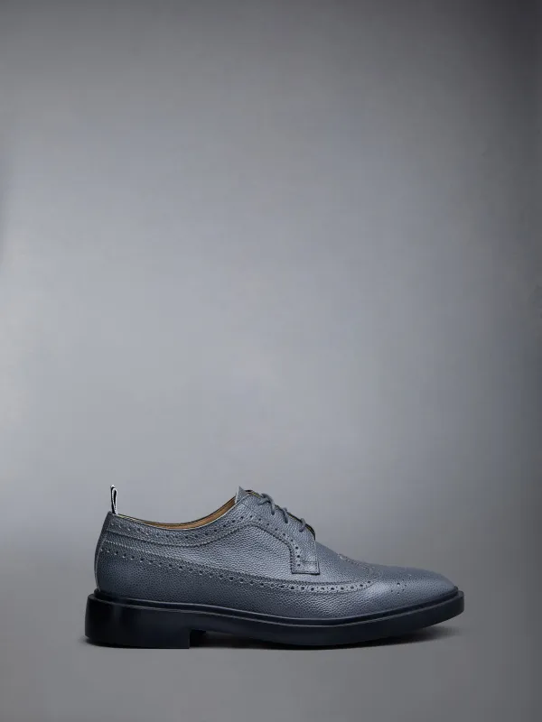 Pebble Grain Leather Longwing Brogue sold by Thom Browne