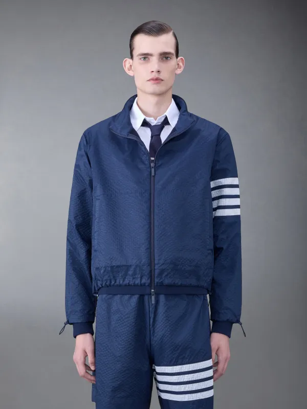 ULTRALIGHT RIPSTOP 4-BAR FUNNEL NECK JACKET sold by Thom Browne