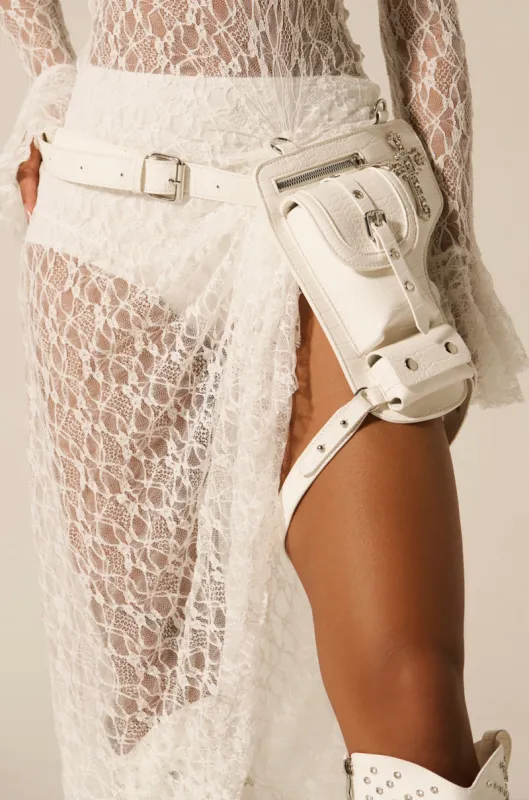 CROSSING THE LINE PU BELT BAG IN WHITE sold by AKIRA