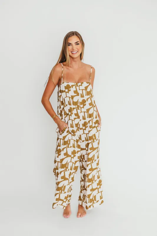 Leilani Geo Print Jumpsuit in Olive sold by Worth Collective