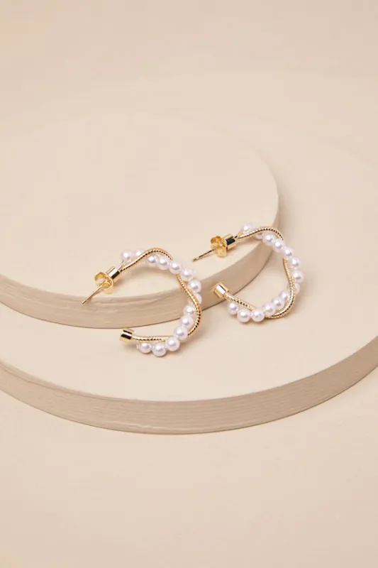 Ciena Gold Pearl Twisted Hoop Earrings sold by Lulus