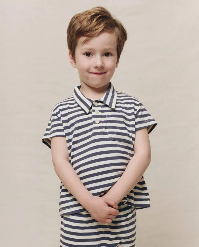 The Little Lacrosse Polo. -- Vintage Blue Stripe sold by THE GREAT.