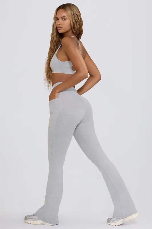 Soft Active Crossover Flared Trousers in Grey Marl sold by Bo + Tee