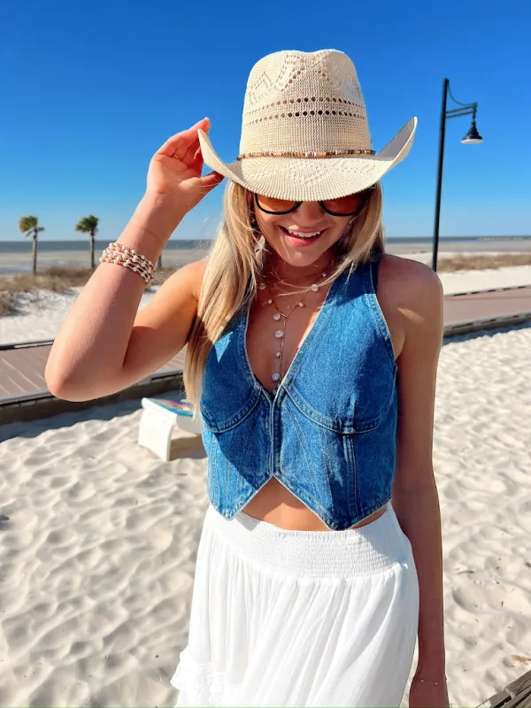Running Wild Denim Vest sold by Bella Rose boutique