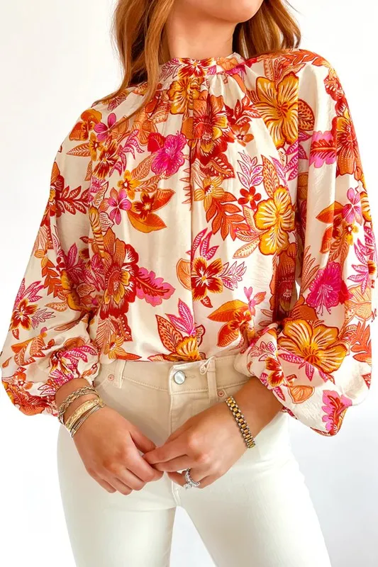 Floral Print Pearl Button Long Puff Sleeve Blouse sold by Charming Charlie