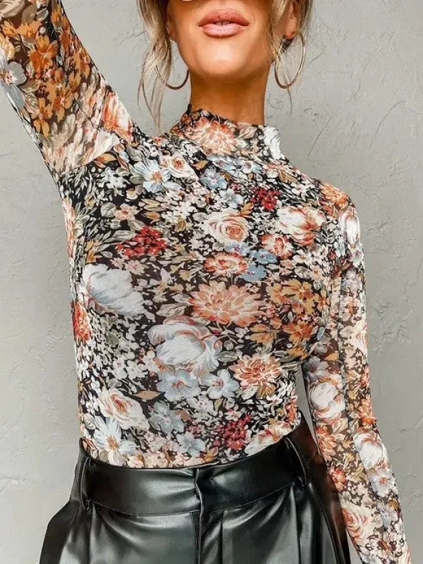 Mock neck floral long sleeve sold by Charming Charlie