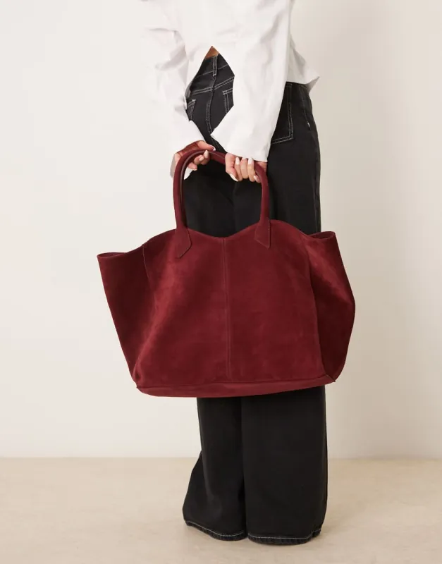 ASOS DESIGN Premium suede bonded tote bag in burgundy-Red sold by ASOS