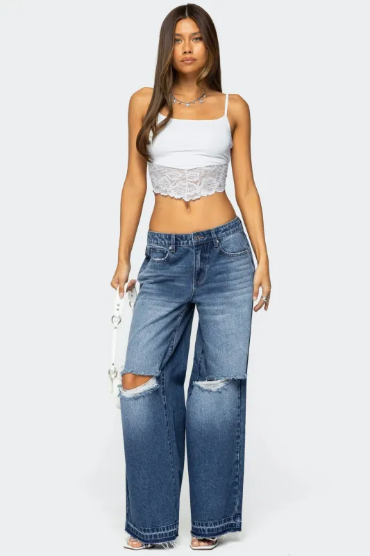 Xenia Distressed Low Rise Jeans sold by Edikted