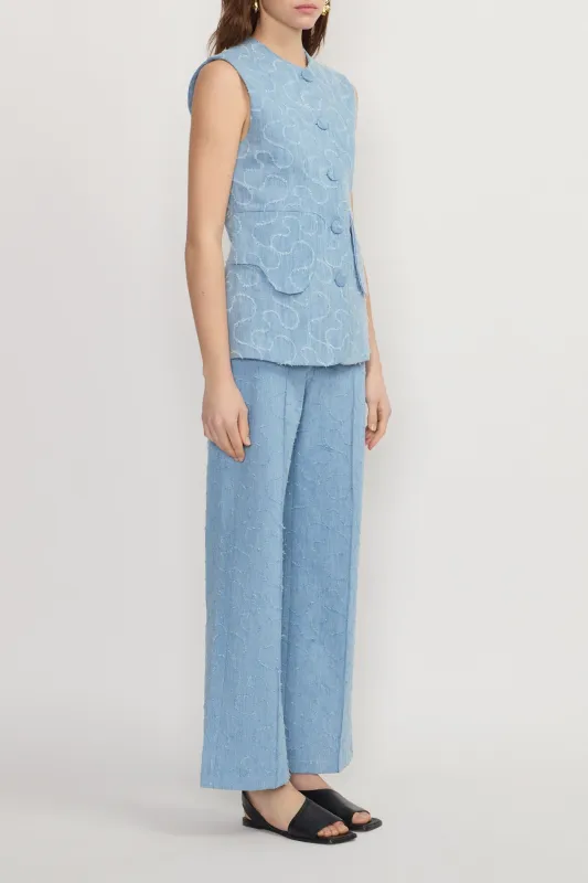 Blue embossed flared trousers sold by DESTREE