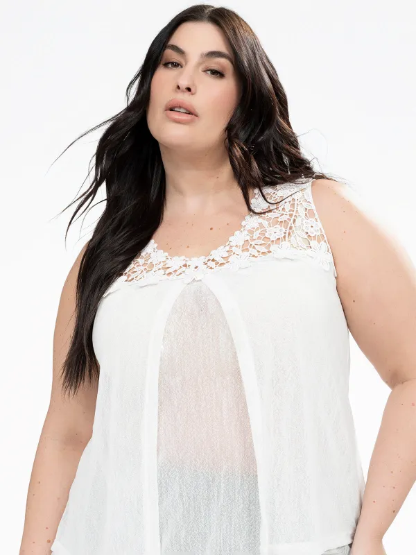 Sleeveless semi-fitted tunic sold by Claire France