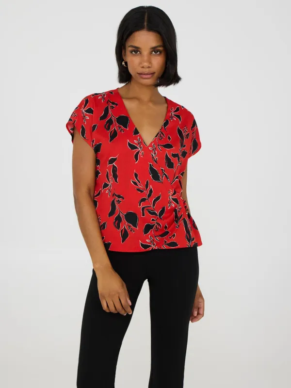 Cap Sleeve Floral Wrap Top sold by Suzy Shier