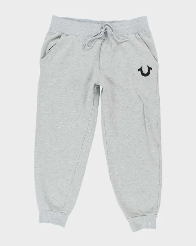 Vintage Y2K True Religion Small Patch Logo Tracksuit Bottoms - L sold by Rokit