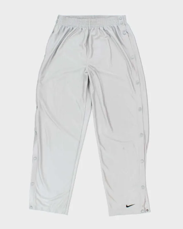Vintage 90's Nike Full Leg Popper Tracksuit Bottoms - L sold by Rokit