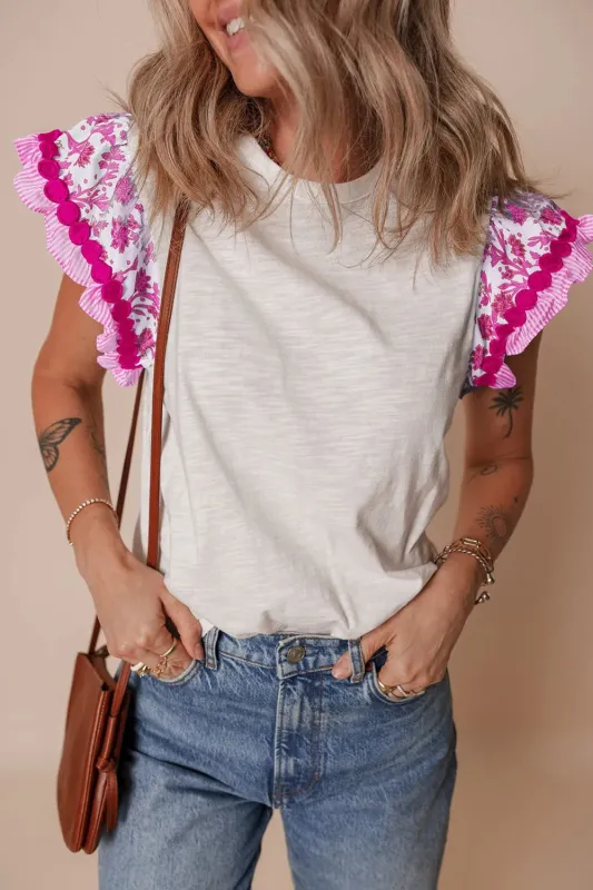 Ruffled Round Neck Cap Sleeve Blouse sold by Charming Charlie