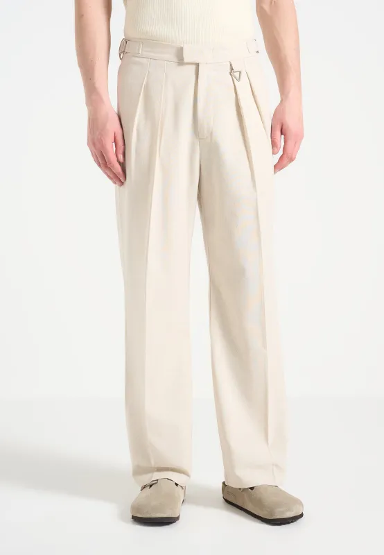Pierre - Relaxed Fit Linen Trouser with Twin Pleat - Natural sold by Maniere De Voir