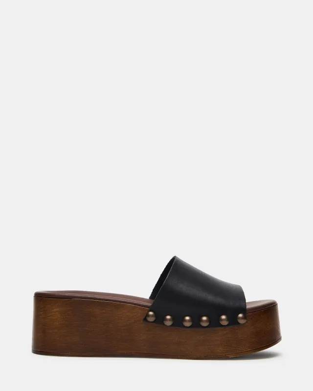 CONGA BLACK LEATHER sold by Steve Madden