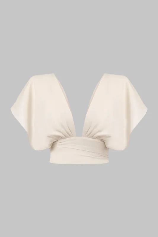 Solid v-hals tank top sold by Micas