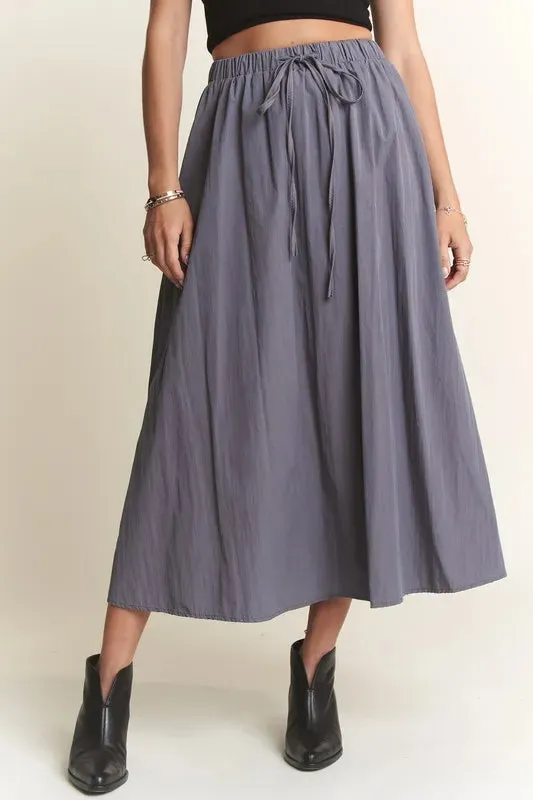 ADORA Drawstring Waist Crinkle Maxi Skirt sold by Charming Charlie