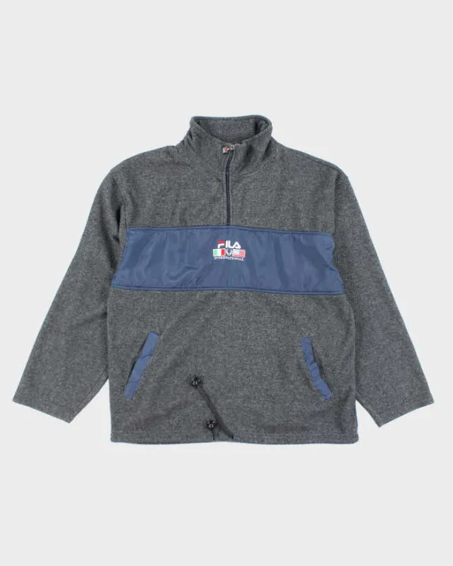 Vintage 90s Fila Quarter-Zip Fleece - XL sold by Rokit