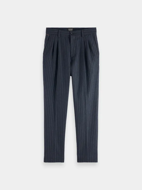 Twilt brushed pleated chinos sold by Scotch and Soda
