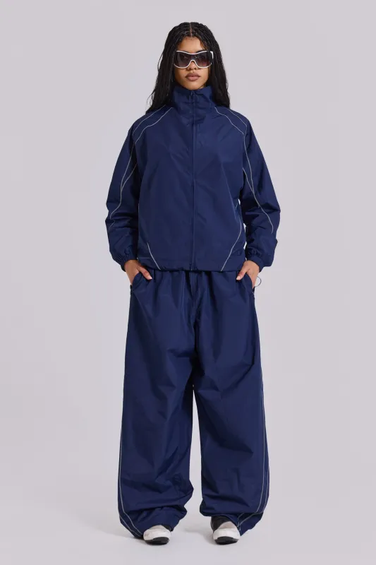 Navy Vapor Tracksuit Bottoms sold by Jaded London