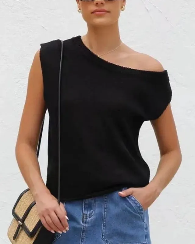 Off shoulder knit top sold by Charming Charlie