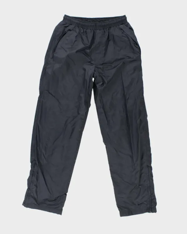Vintage Y2K Nike Wide Leg Track Suit Bottoms - M sold by Rokit