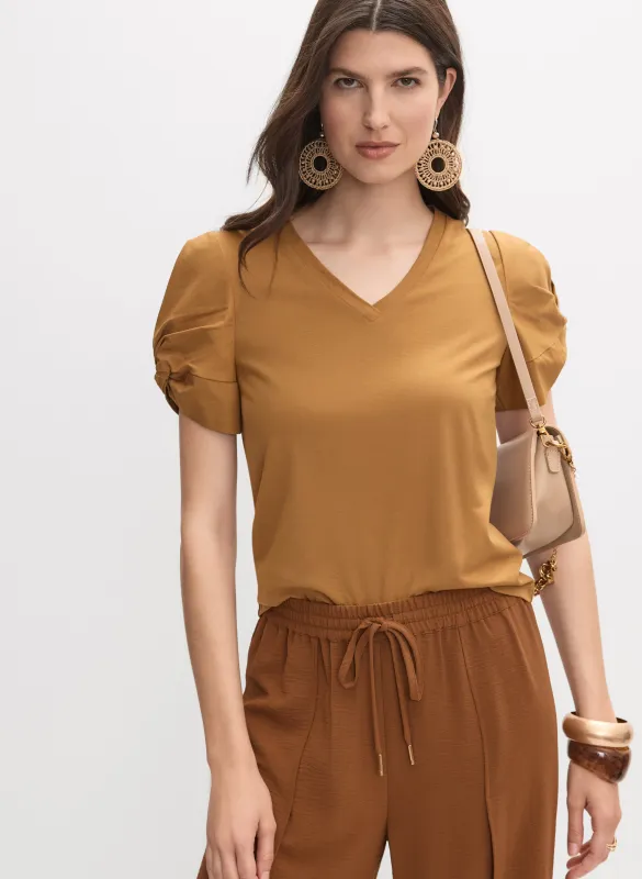 Puff Sleeve Top sold by Melanie Lyne