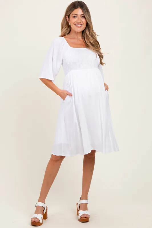 White Smocked Maternity Midi Dress sold by Pinkblush