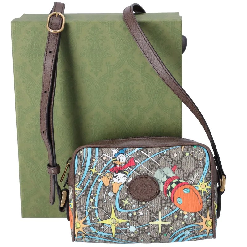 GUCCI x Disney GG Supreme Shoulder Bag 648124 Gray Beige Donald Duck sold by Gaby's Bags