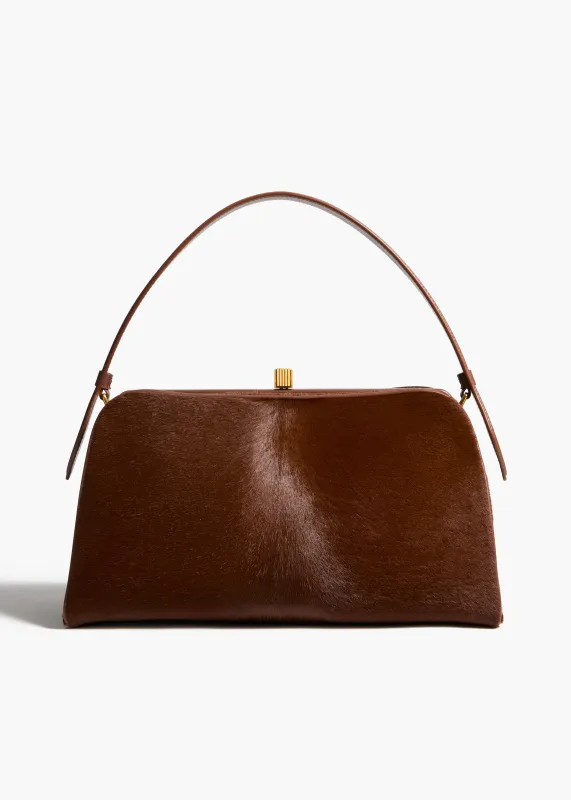 Cate Bag in Rust Haircalf sold by KHAITE