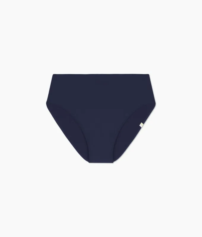 The High Leg High Rise Bottom - Deep Sea sold by Summersalt