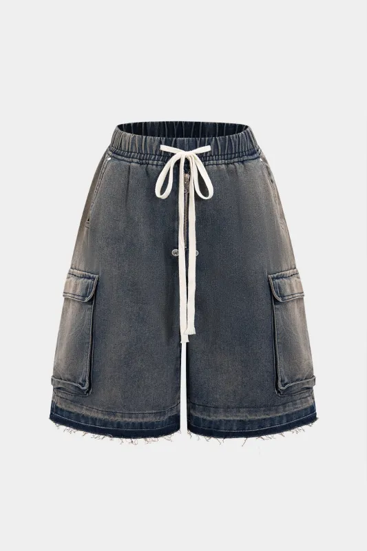 Denimtrækkede lommehorts sold by Micas