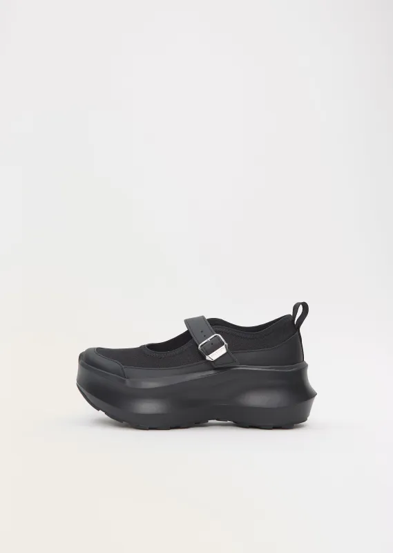 CDG x Salomon RX Marie-Jeanne Platform — Black sold by La Garconne