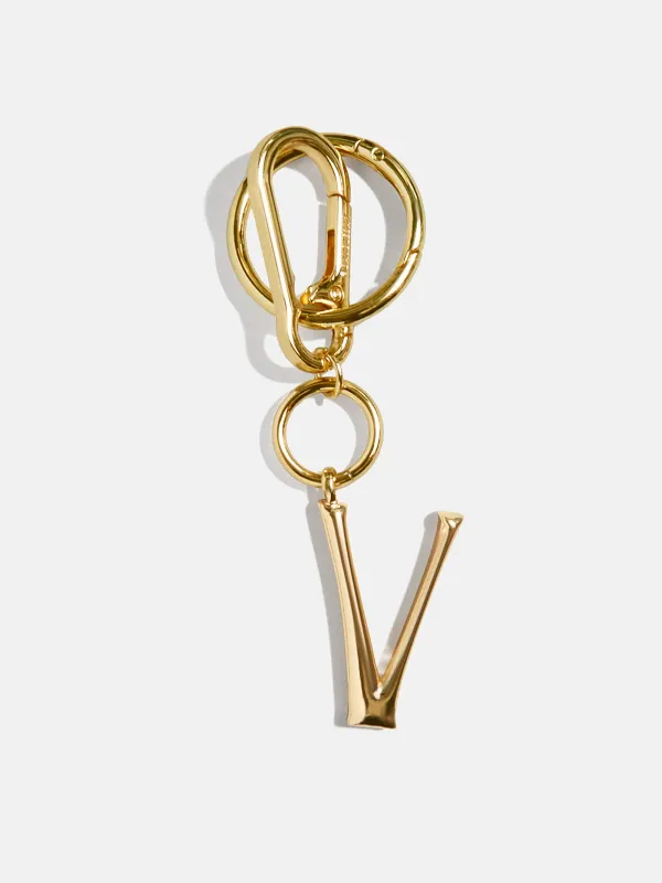 Gold Initial Enamel Bag Charm - V sold by BaubleBar