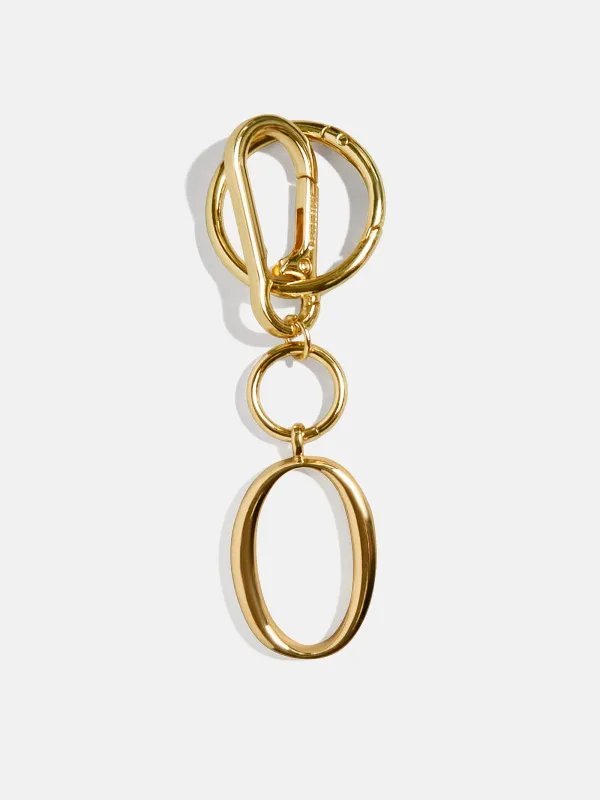 Gold Initial Enamel Bag Charm - O sold by BaubleBar
