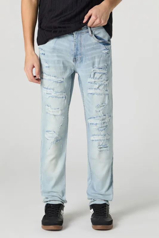 Jean mince en denim extensible d'aspect usé délavé pâle sold by Urban Planet