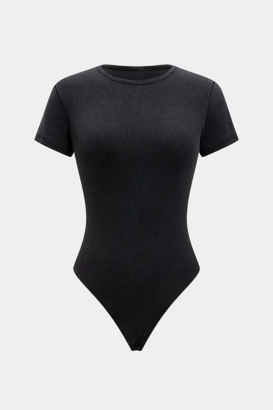 Knappet kortærmet bodysuit sold by Micas