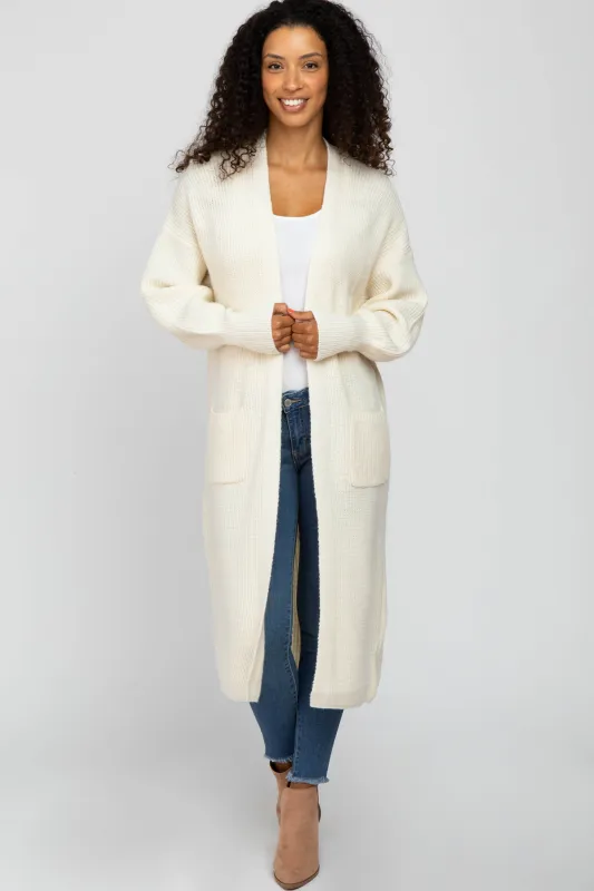 Ivory Bubble Sleeve Long Cardigan sold by Pinkblush