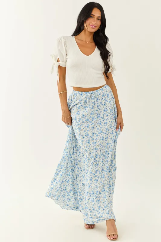 Ivory Floral Print Tiered Flowy Maxi Skirt sold by Lime Lush