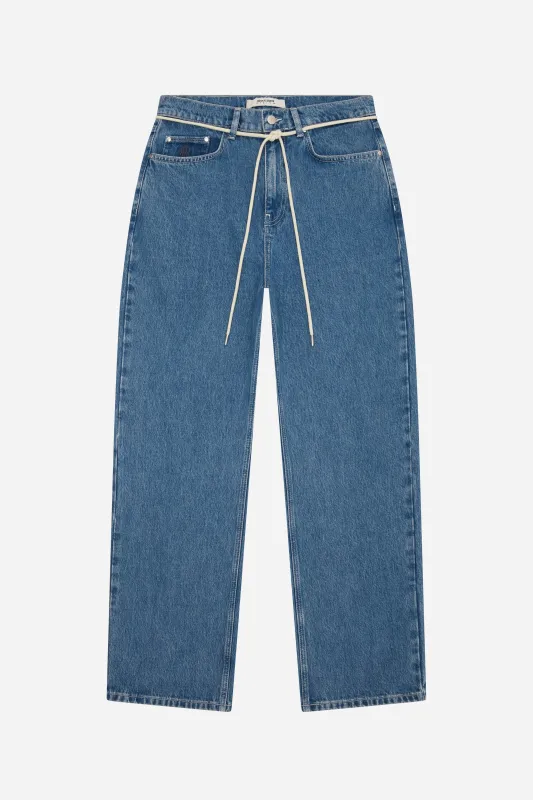 relaxed denim mid wash sold by about:blank