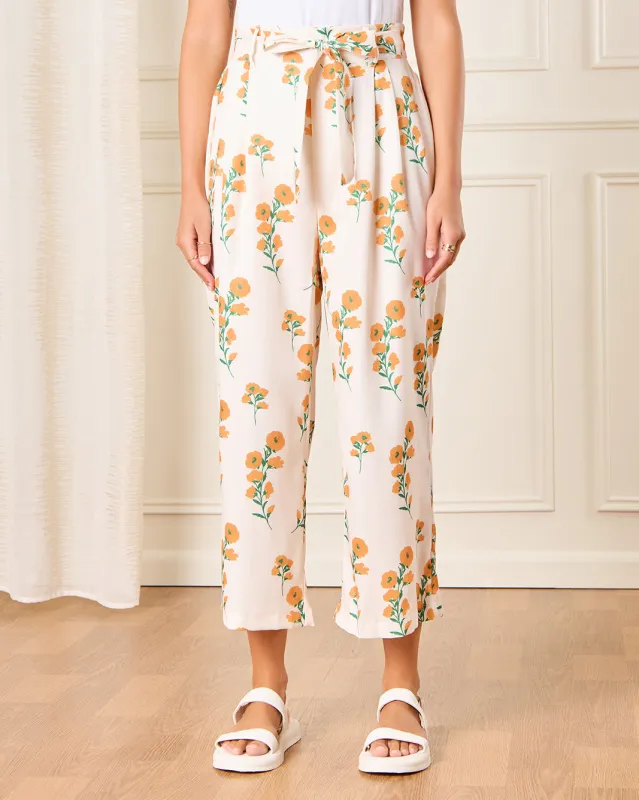Women Peach Printed Casual Trousers sold by Redtag