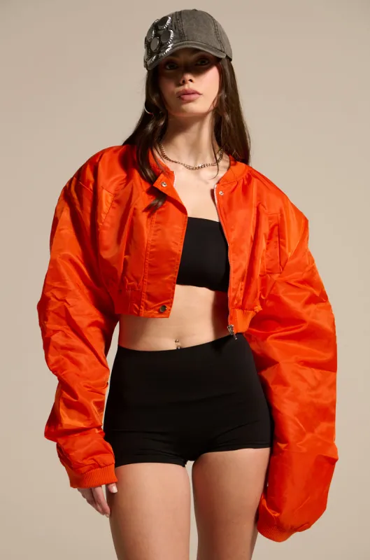 TAKE IT EASY CROPPED BOMBER IN ORANGE sold by AKIRA